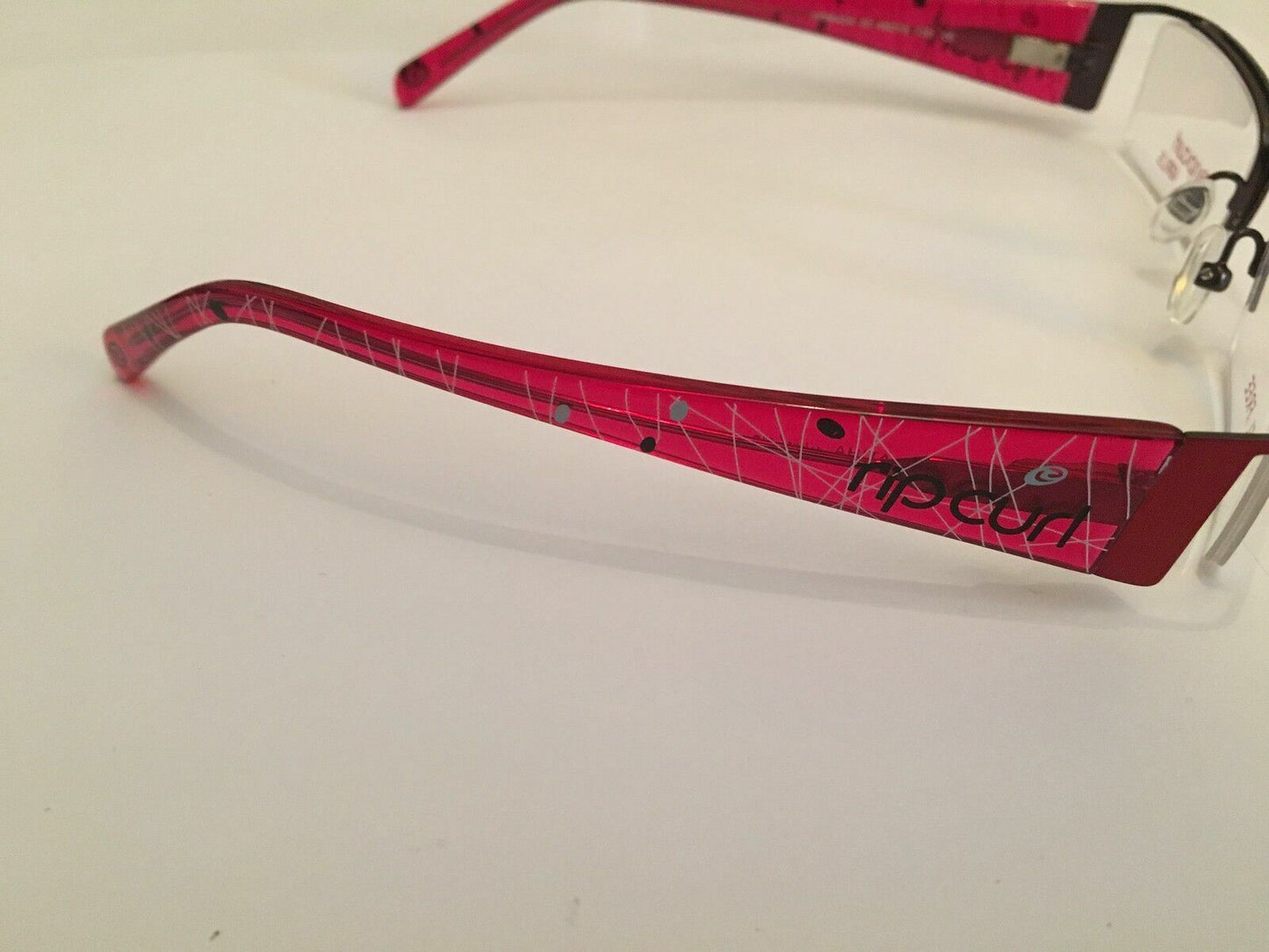 Kids Girls Rip Curl Glasses In A Pinky Red Design VOMA04 NEW RRP £79