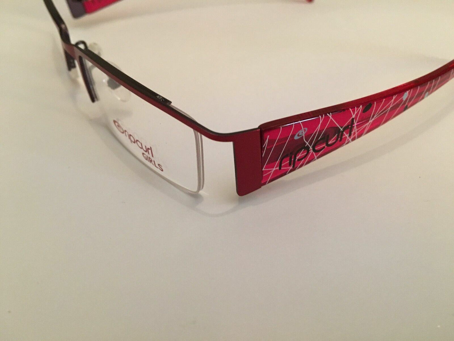 Kids Girls Rip Curl Glasses In A Pinky Red Design VOMA04 NEW RRP £79
